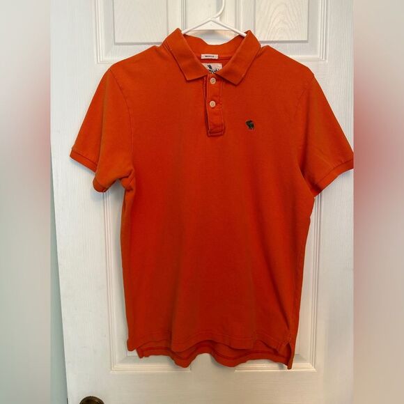 ABERCROMBIE Boys Young Men’s Orange  Short Sleeve Polo Shirt Size Medium - Picture 1 of 3